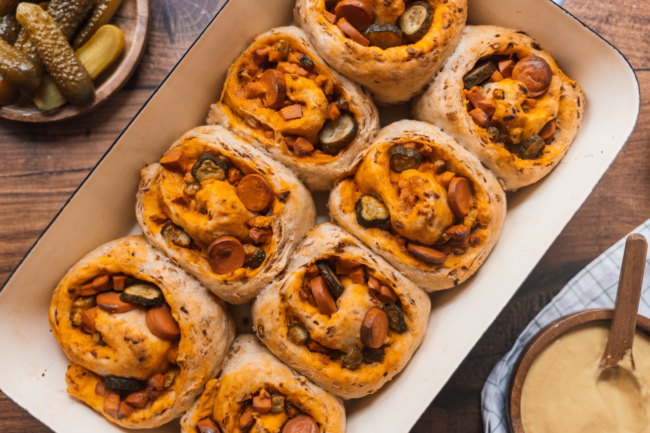 vegan hot dog buns in a baking dish