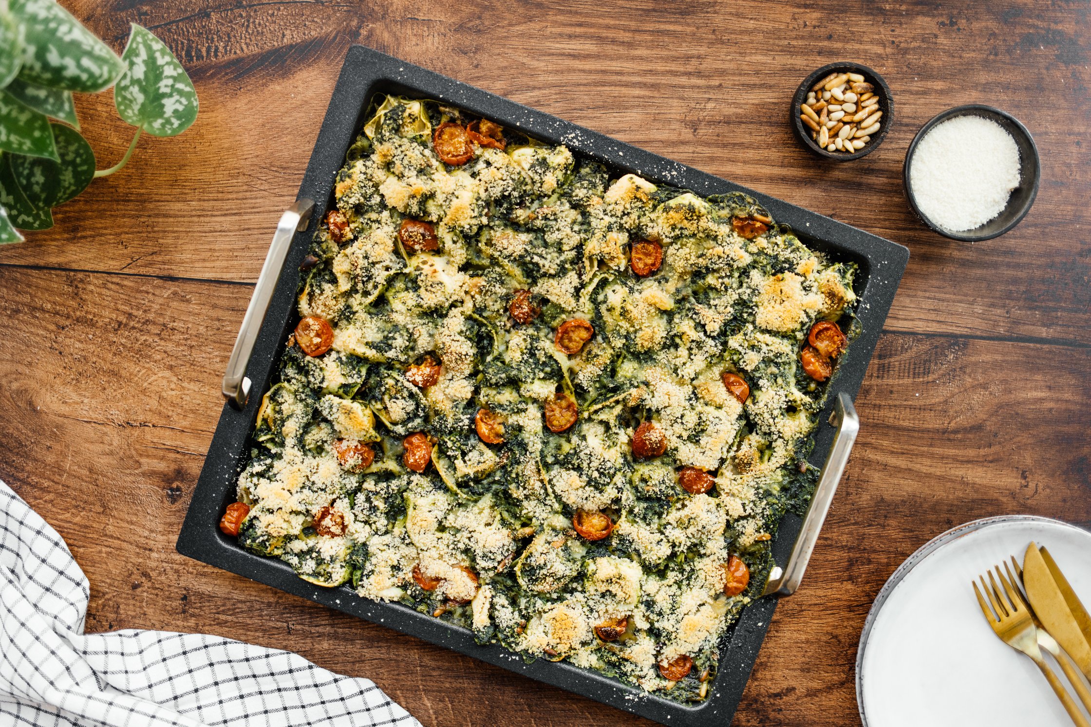 baked vegan tortellini casserole on a baking sheet
