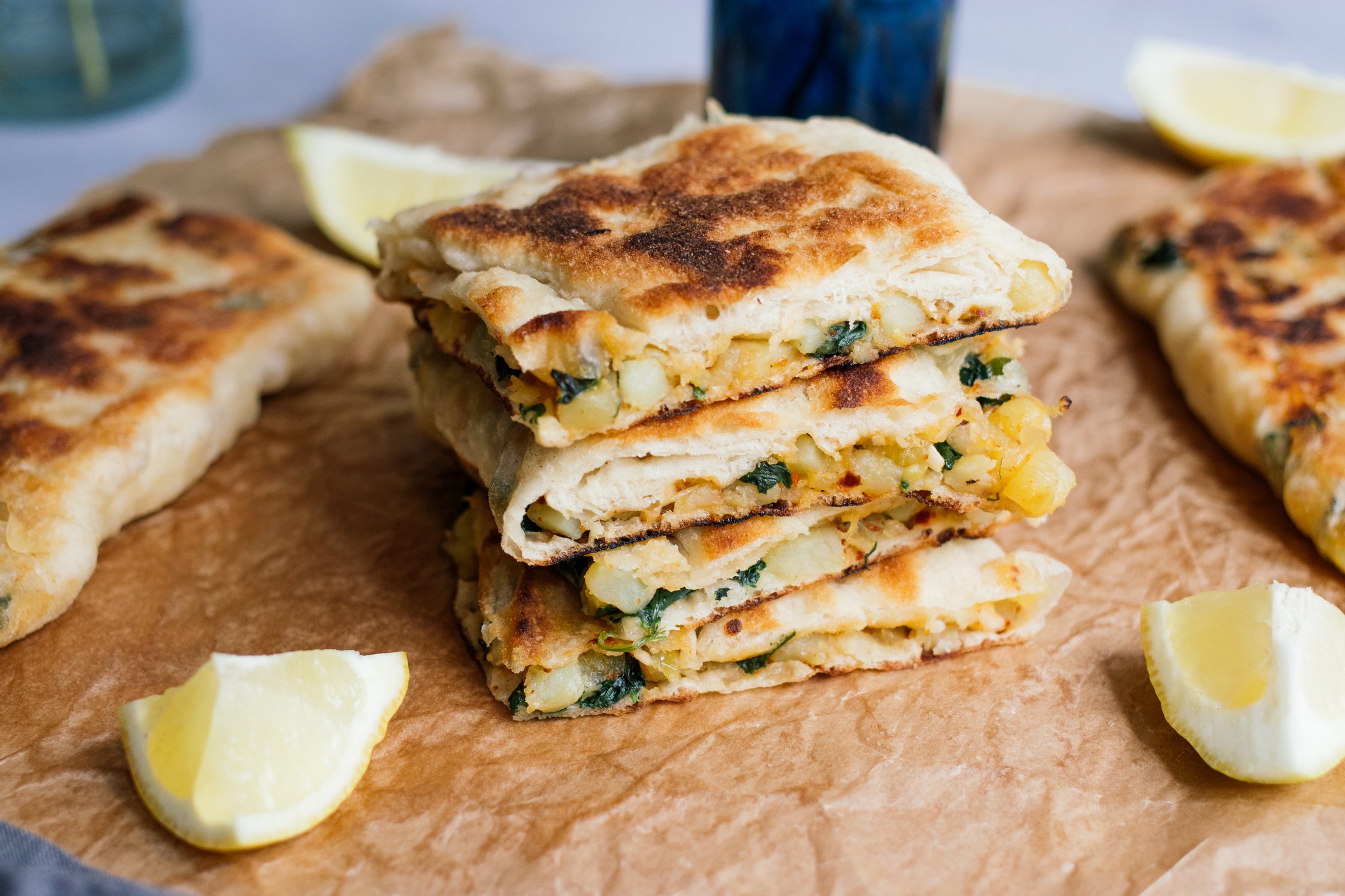 vegan gozleme served with lemon wedges