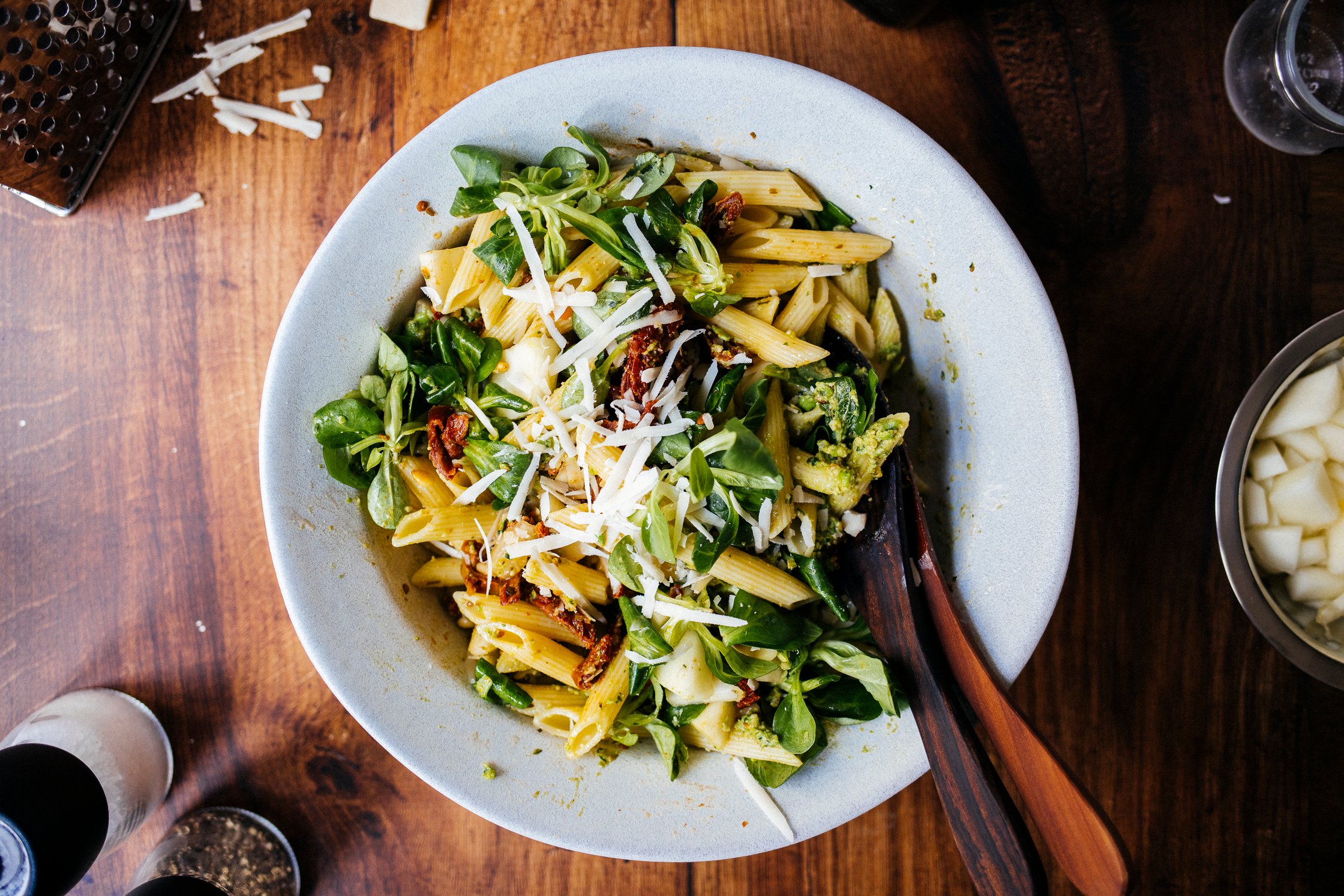 vegan pasta salad with honeydew melon in a bowl