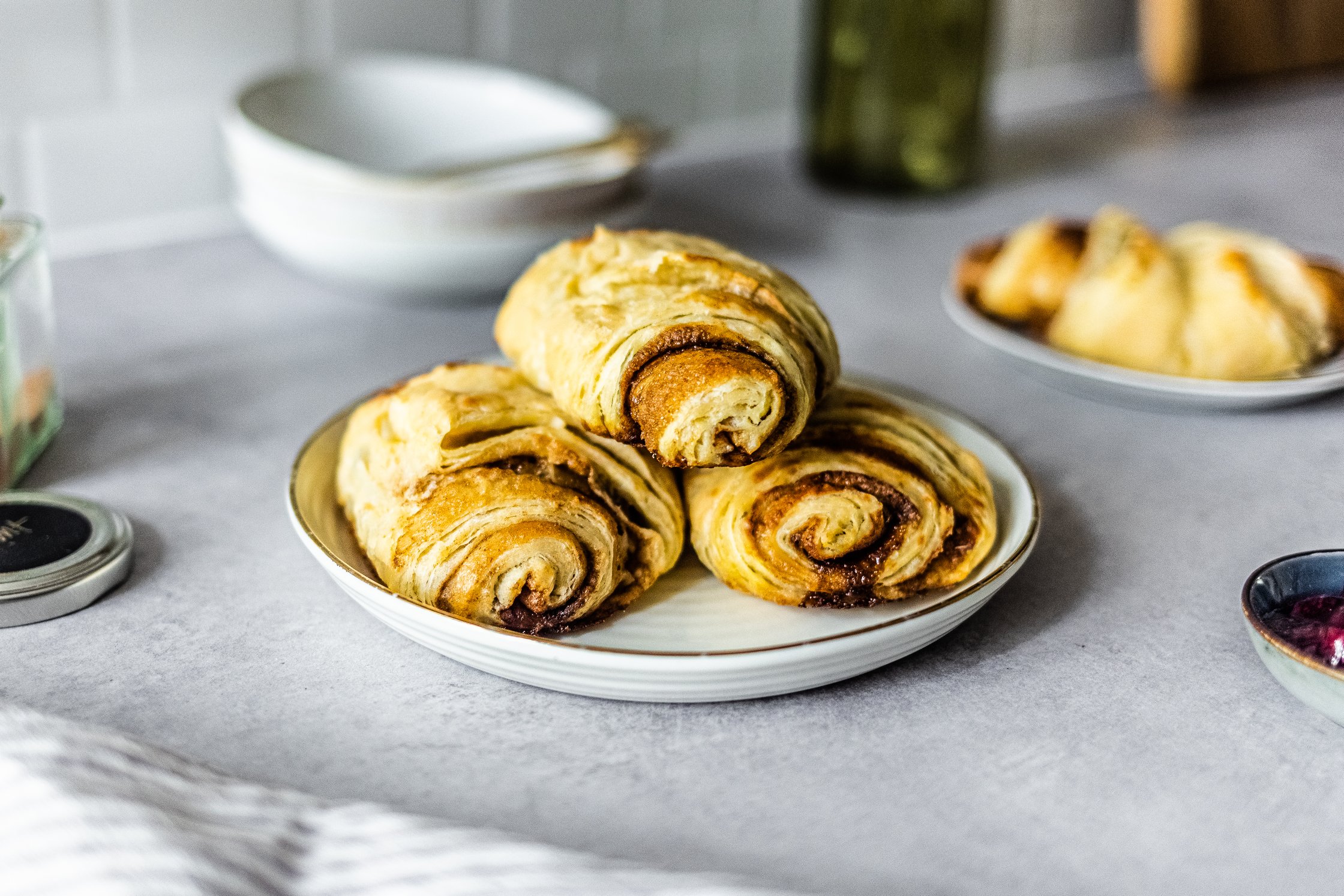 vegan franzbrötchen on a small plate