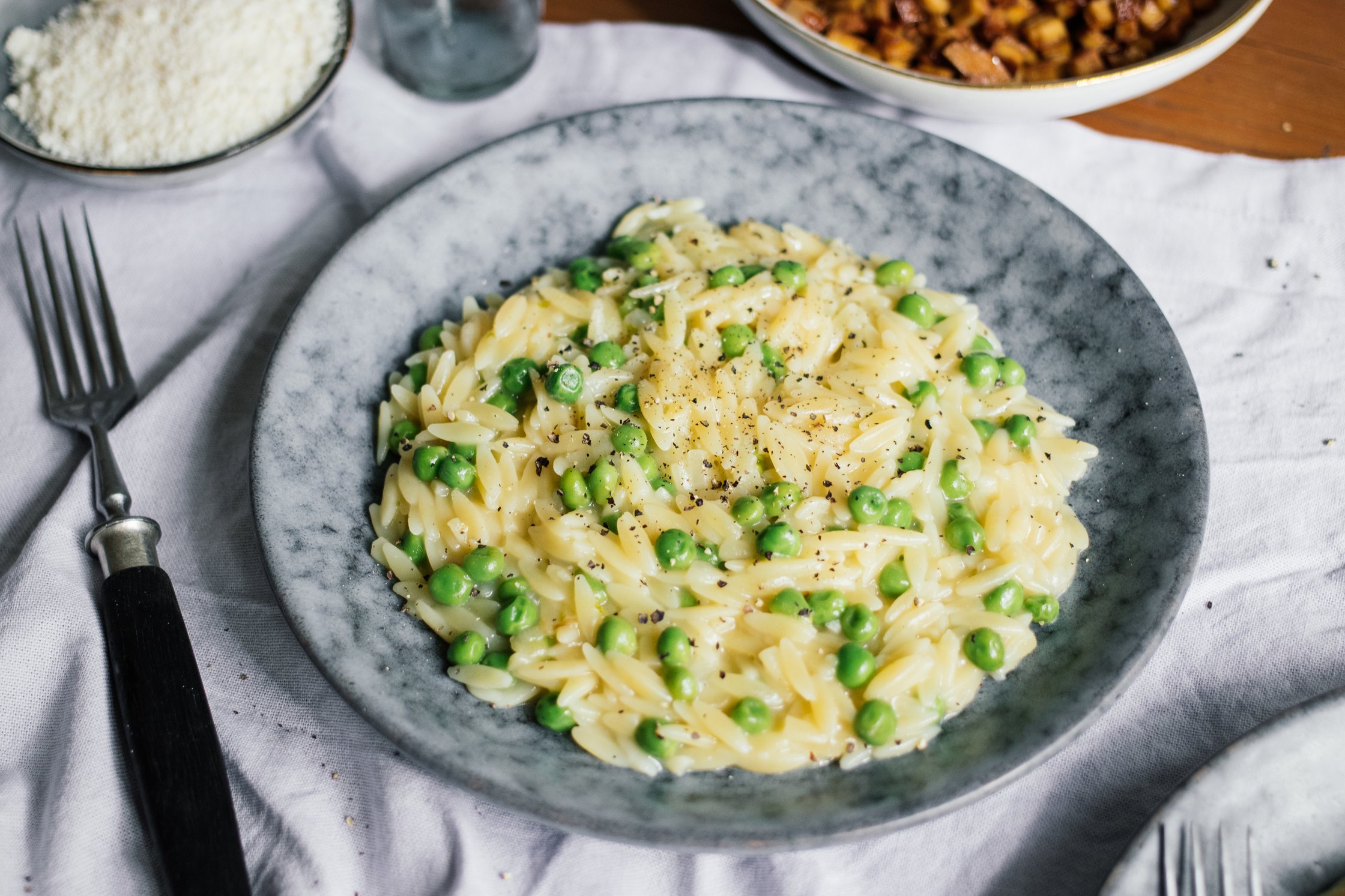 closeup of Vegan Orzotto with Peas