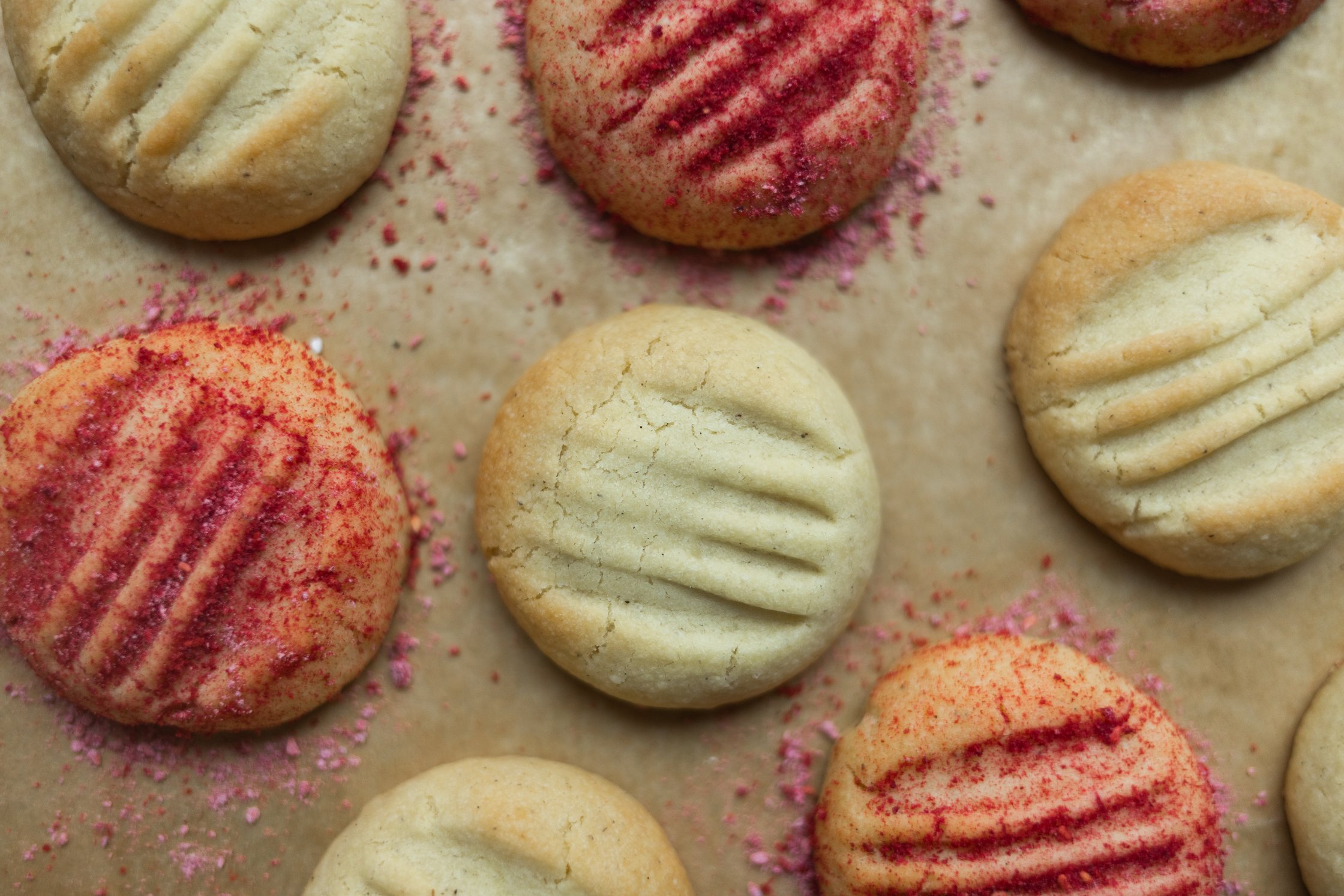 baked vegan custard cookies with raspberry powder