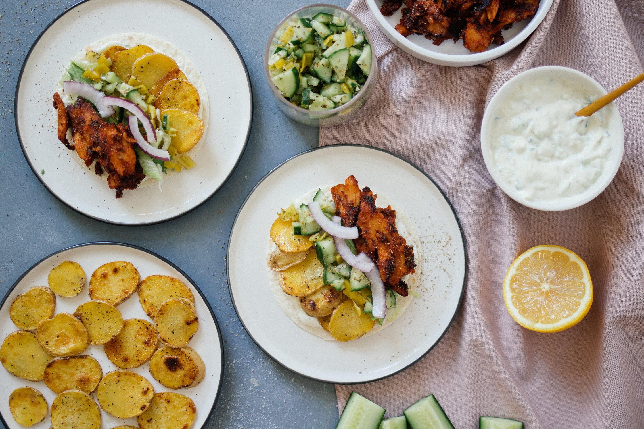 gyros taco next to potato slices