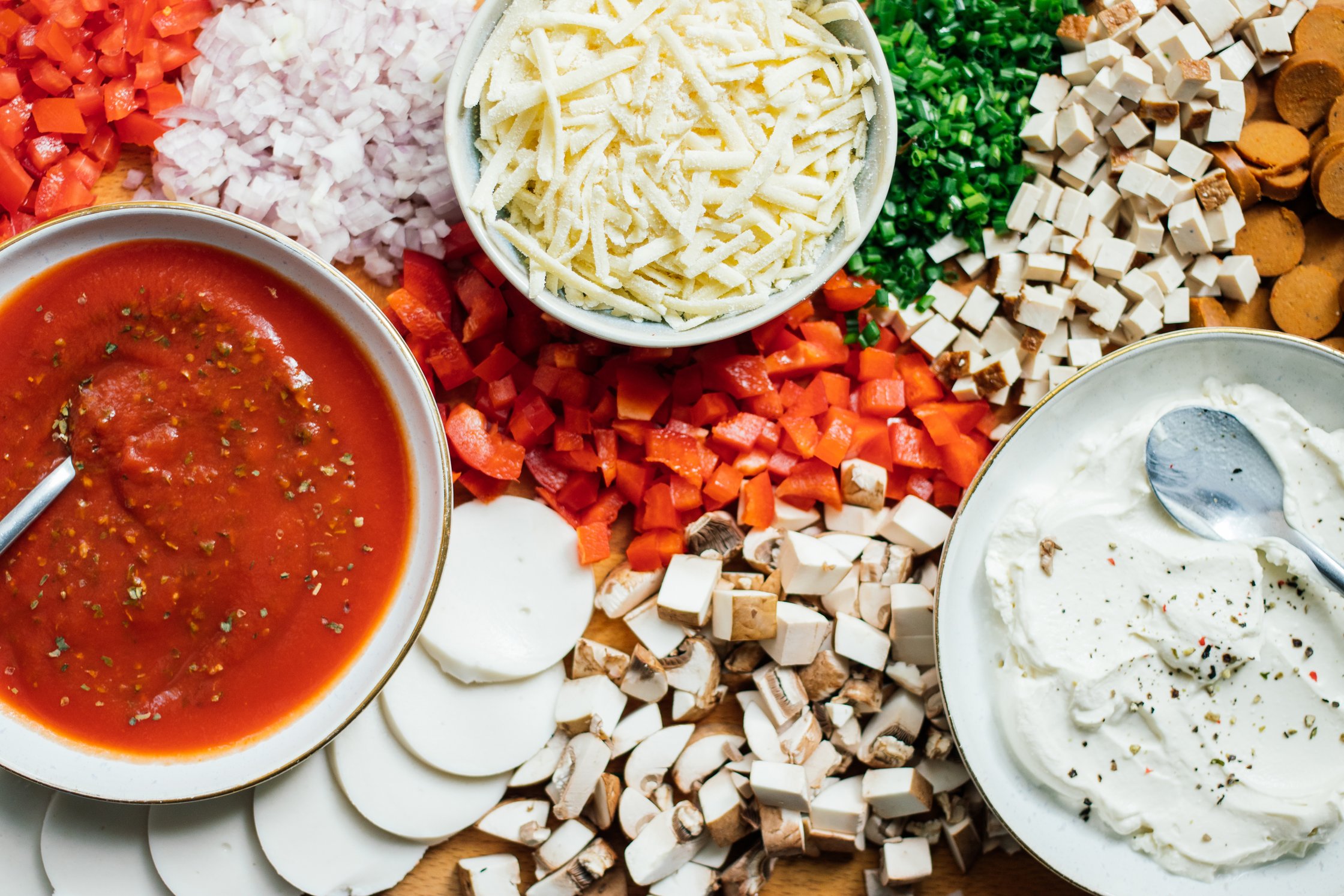 ingredients and toppings for vegan french bread pizza