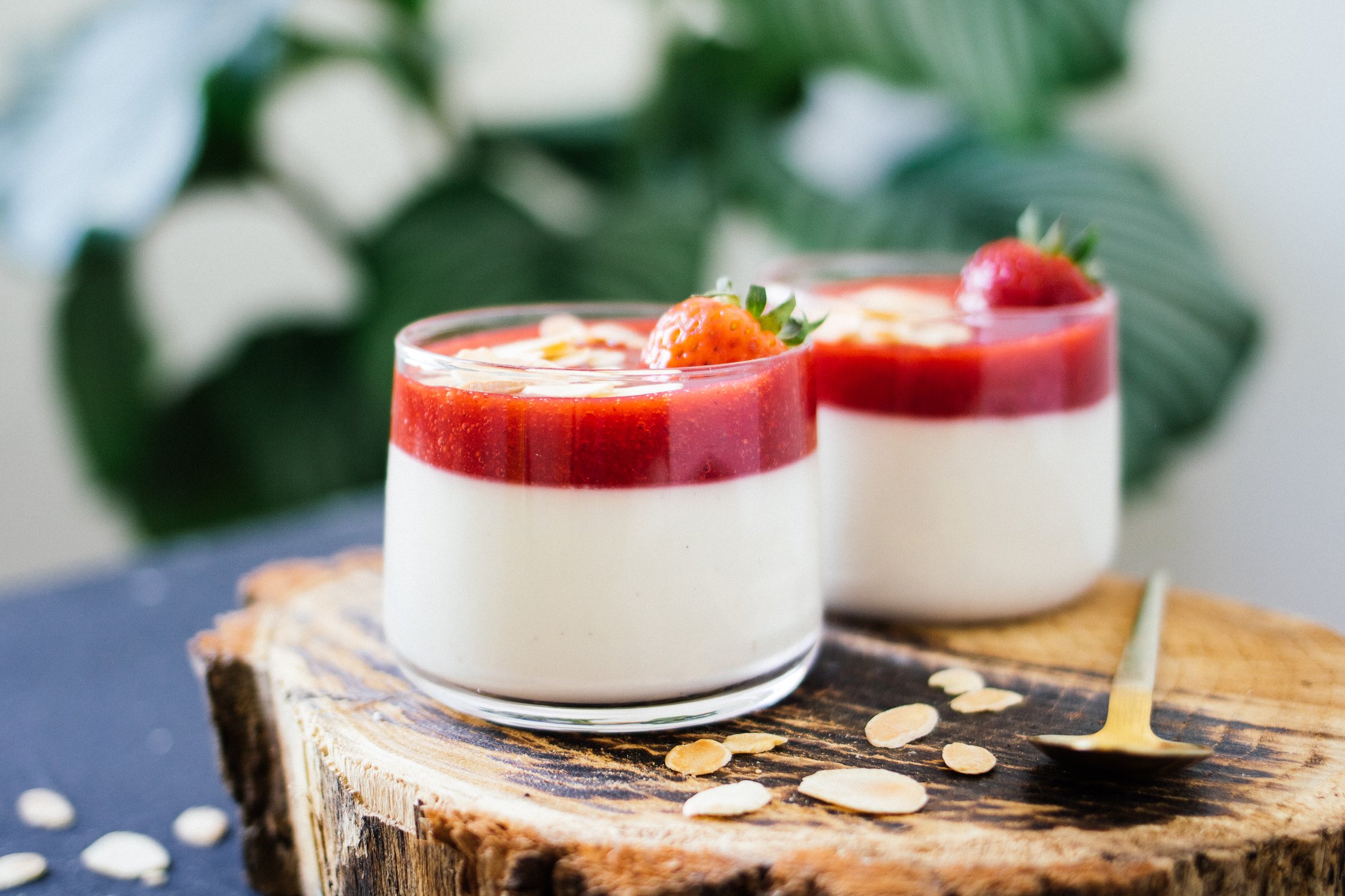 vegan coconut panna cotta on a wooden backdrop