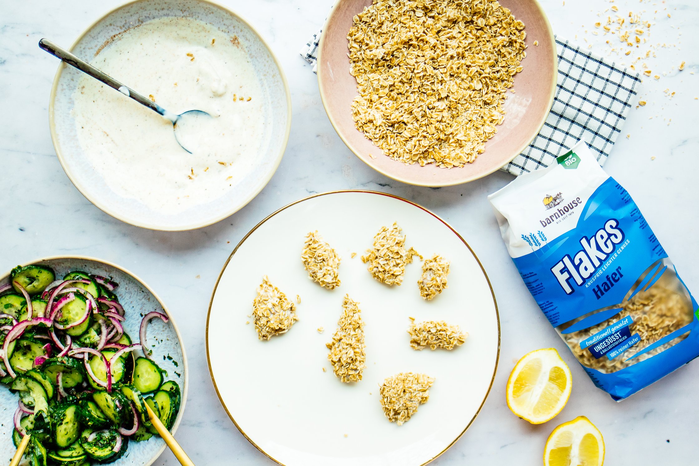 breading vegan chicken with oat flakes