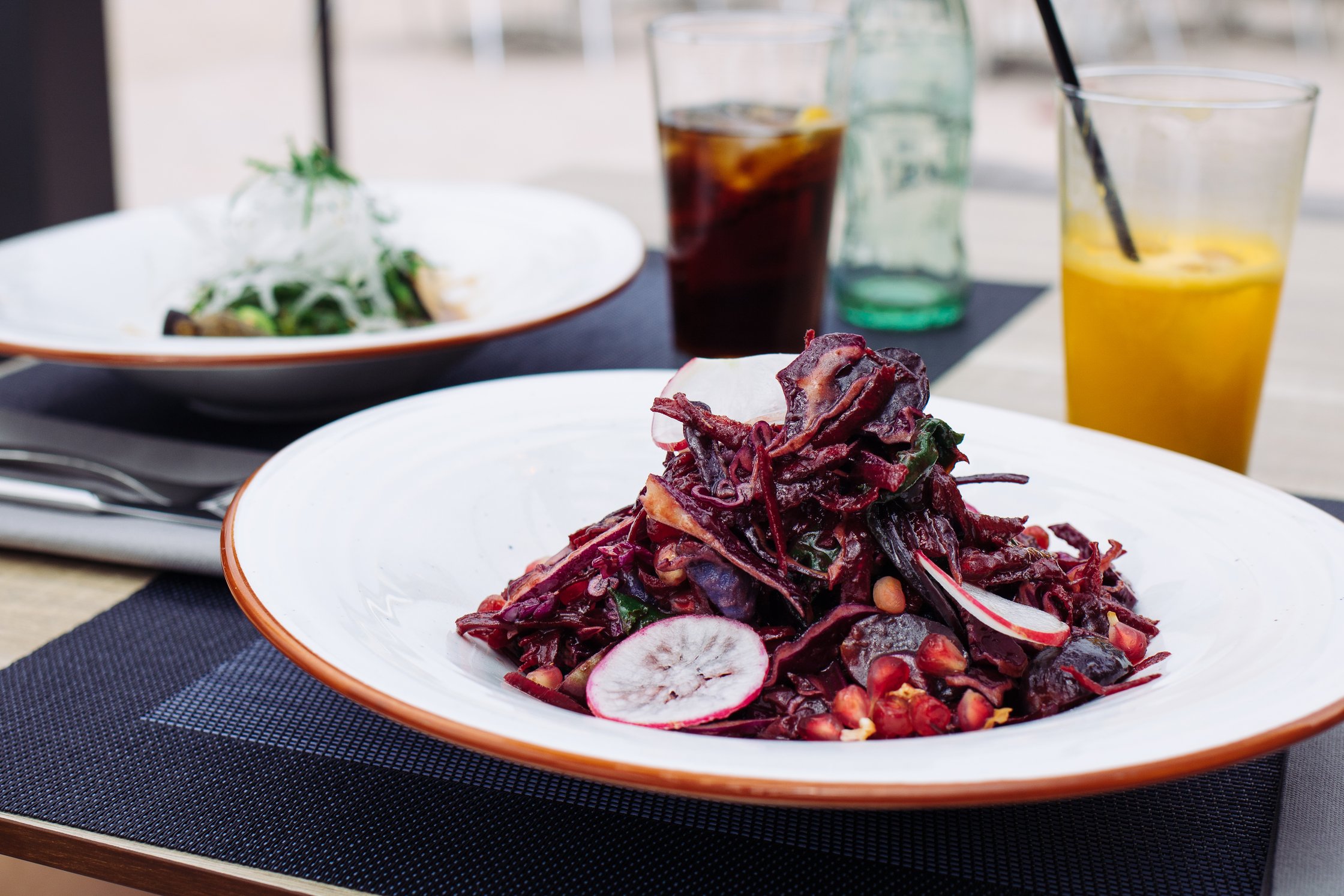 a plate with red salad