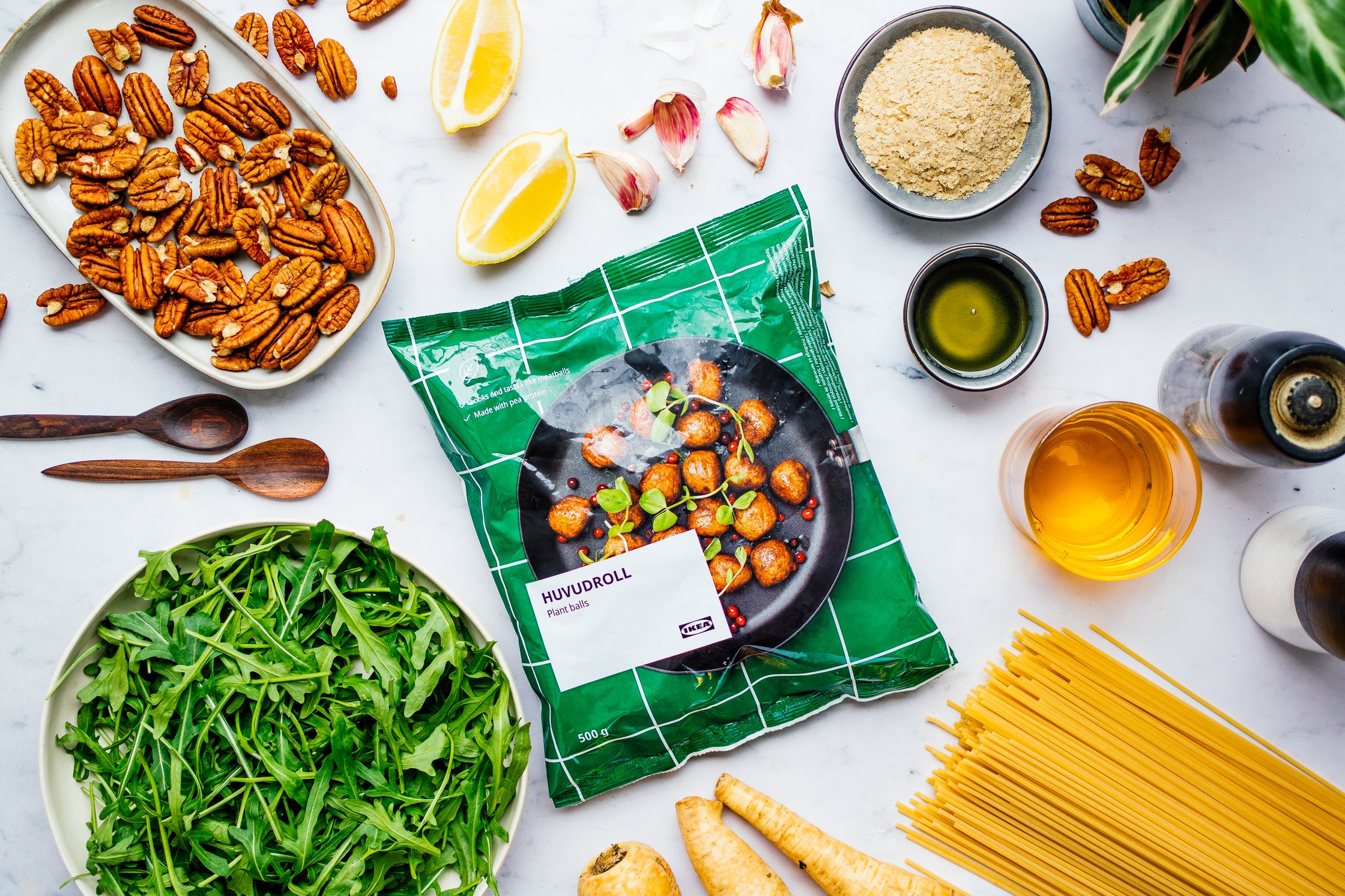vegan meatballs from IKEA next to pasta and arugula