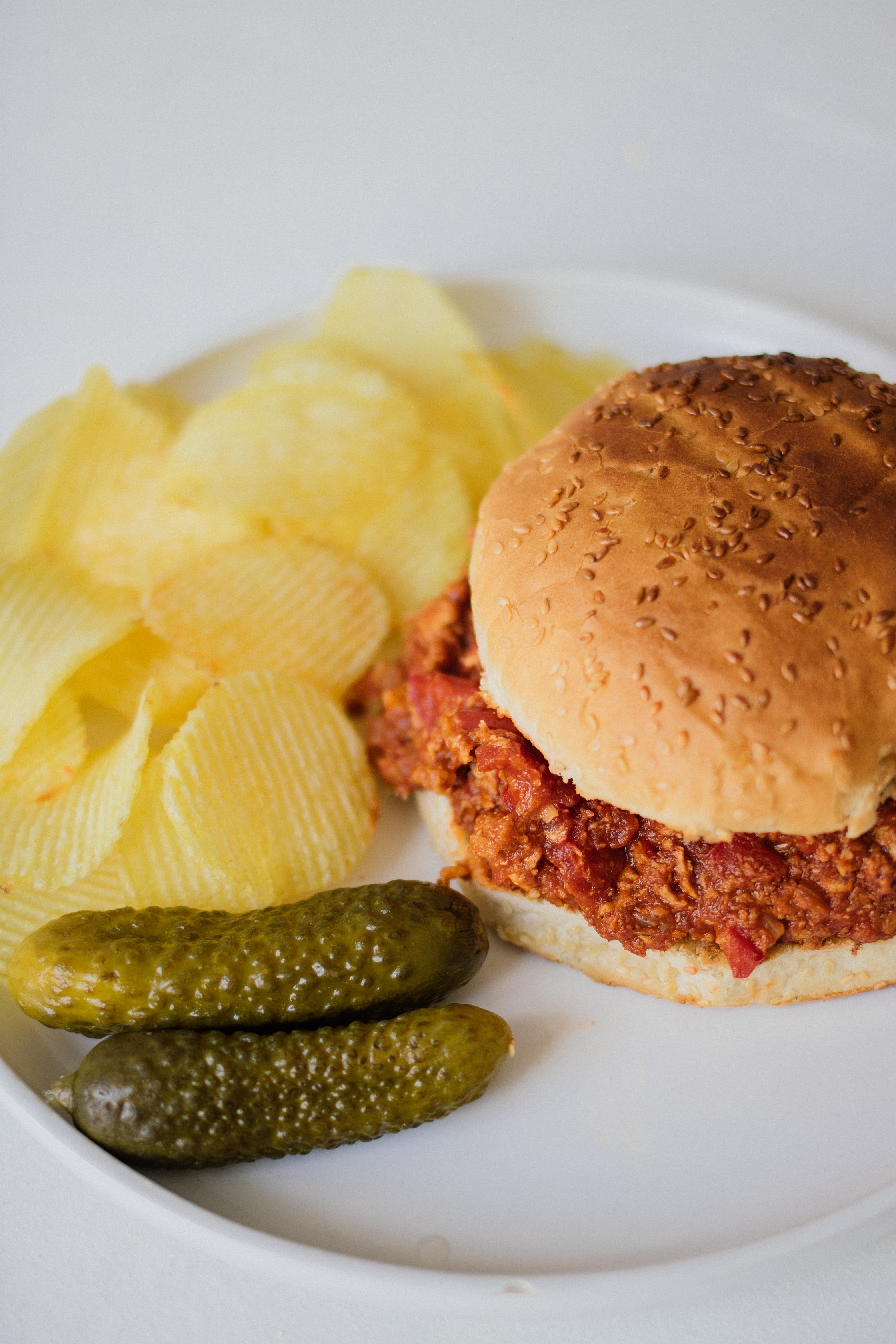 vegan sloppy joe with pickles and chips