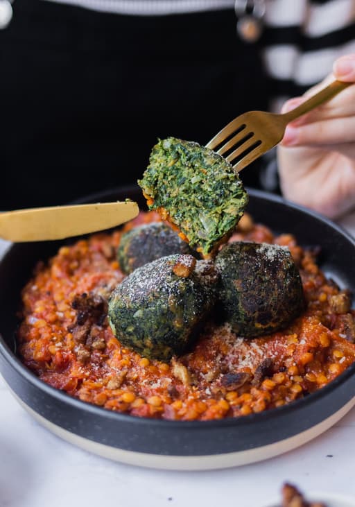 Vegan Spinach-Bread Dumplings with Tomato-Lentil Sauce