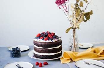 Simple, vegan chocolate cake with berries