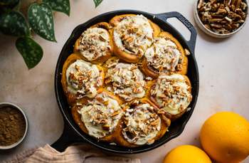 Vegan Pumpkin Spice Buns with Orange Buttercream and Pecans